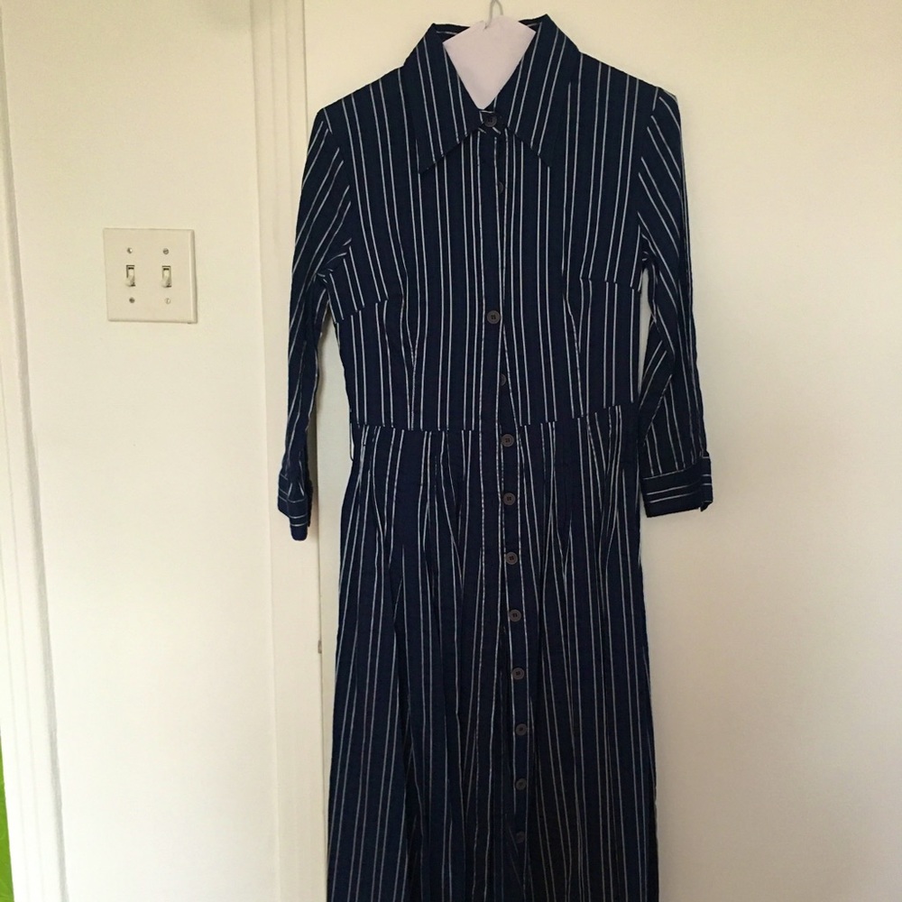Country club look dark blue dress in stripes